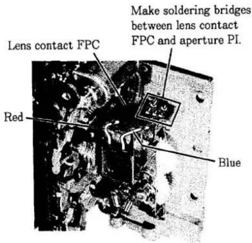 Make soldering bridges between lens contact FPC and aperture PI. Lens contact FPC Red Blue