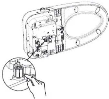 Technical line drawing of an electronic device casing with internal components and a magnified inset showing a component being inserted (no text or symbols present)