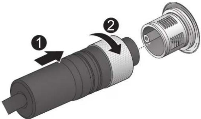 Technical diagram of a mechanical component with numbered parts and directional arrows indicating assembly or assembly.