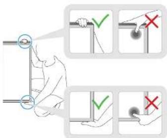 Diagram illustrating hand positioning and alignment of a wall-mounted device, with checkmarks and X marks indicating correct and incorrect states.