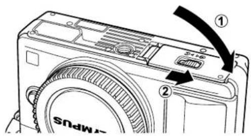 OLYMPUS E-PM2 - Closing the battery/card compartment cover. - 1