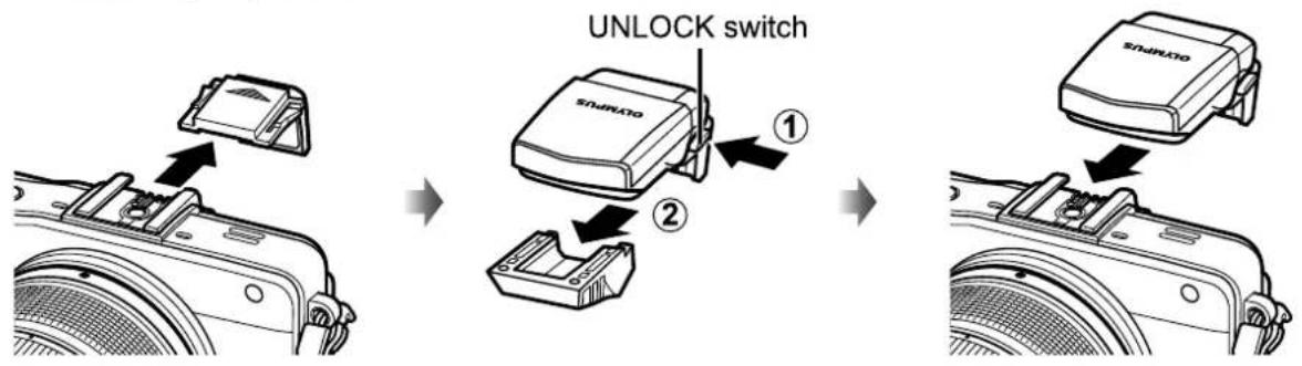 OLYMPUS E-PM2 - Remove the terminal cover from the flash unit and attach the flash to the camera. - 1