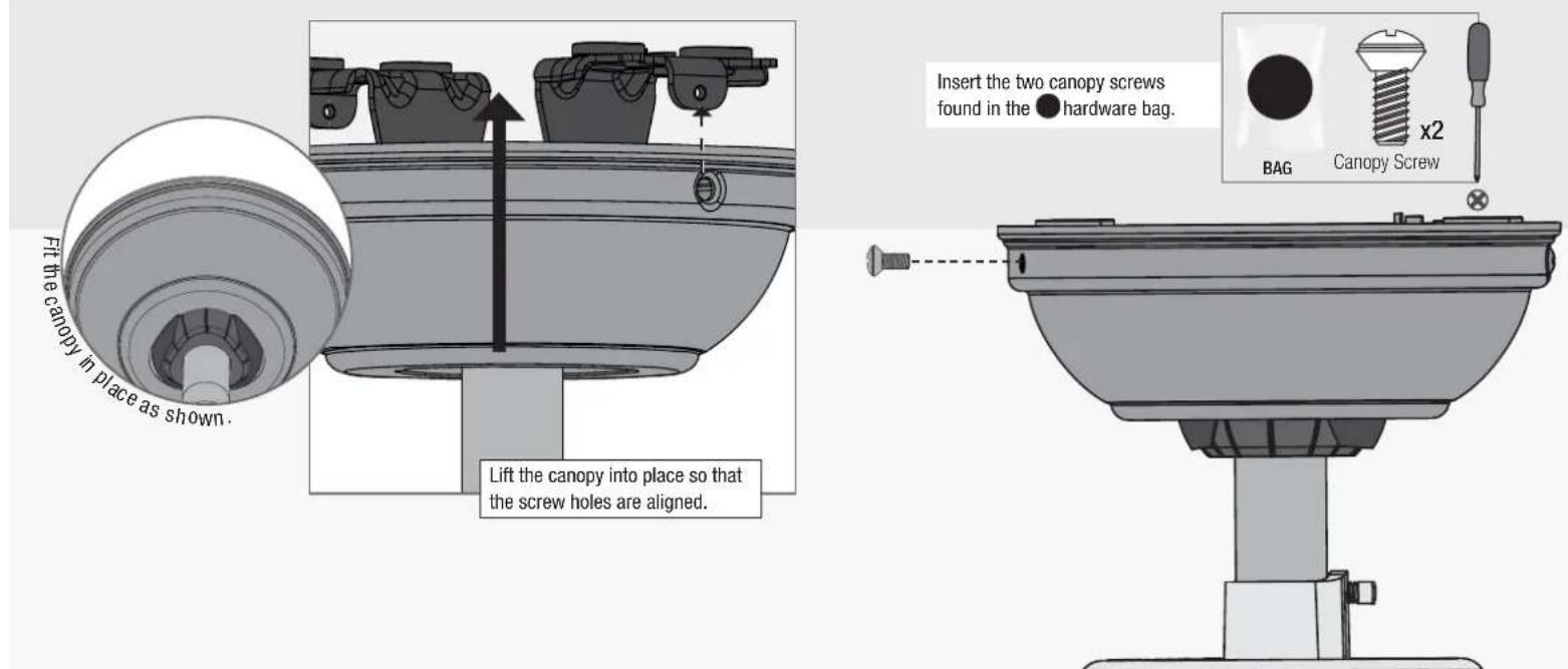 Fit the canopy in place as shown. Lift the canopy into place so that the screw holes are aligned. Insert the two canopy screws found in the hardware bag. BAG Canopy Screw x2