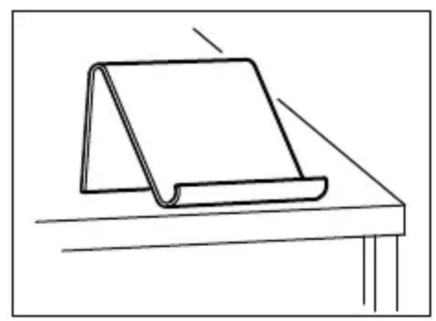 Simple line drawing of a folded document or stand on a table, no text or symbols present