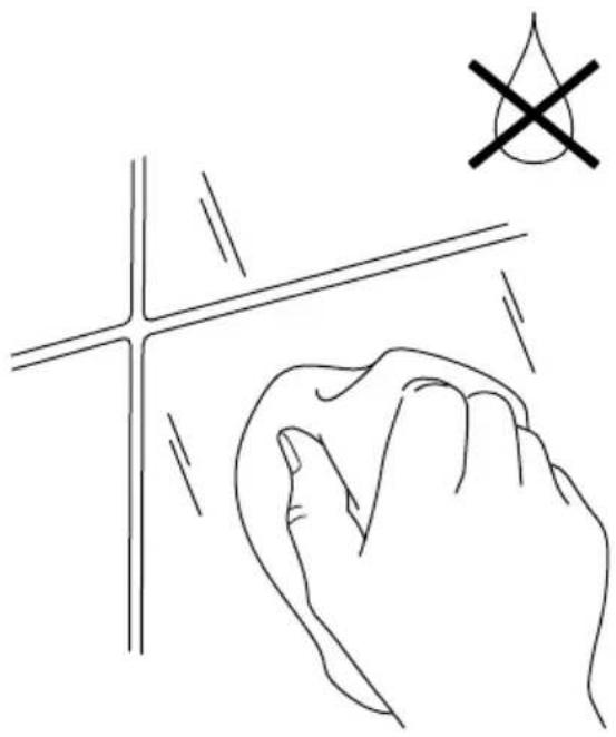 Line drawing of a hand touching a cross-shaped object with a symbol (no text or labels)