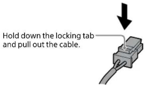 Hold down the locking tab and pull out the cable.