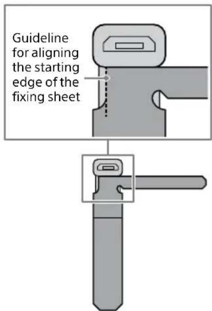 Guideline for aligning the starting edge of the fixing sheet