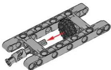 Mechanical assembly diagram showing a chain with a central component and directional arrow (no text or symbols)