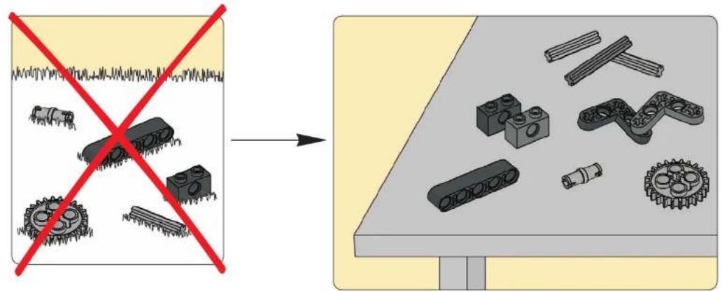 Diagram showing a red X-shaped cross symbolizing a mechanical assembly or disassembly process, with a 3D model of interconnected blocks and gears on a table (no text or labels)