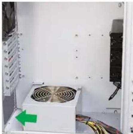 Interior view of an open computer case with a power converter and cable, showing no visible text or symbols.