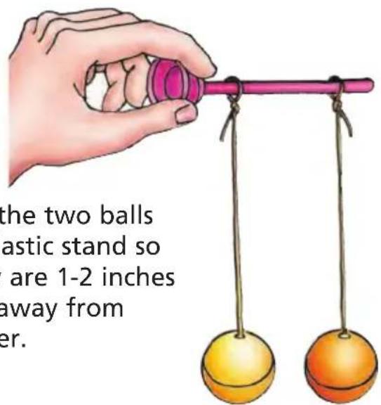 the two balls elastic stand so are 1-2 inches away from er.