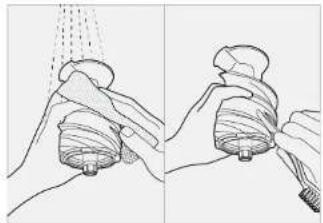 KUVINGS REVO830 - Under running water, clean the outside of the juicing screw with a dish scrubber. Use the tip of the cleaning brush to push out any residue in the crevices on the bottom of the juicing screw. - 1