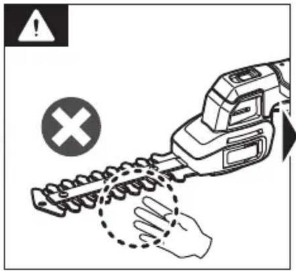 Safety warning illustration showing a hand using a hairclip to clean a tool, with warning symbols and a cross symbol.