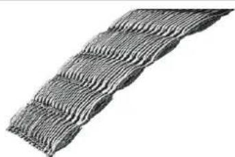 Close-up of a textured, wavy surface with no visible text or symbols