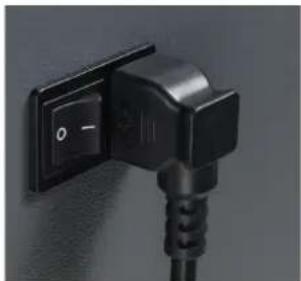 Close-up of a black electrical plug with a switch and power cord (no visible text or symbols)