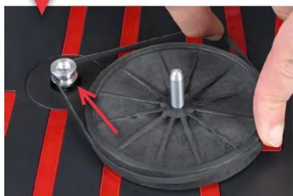 PRO-JECT Elvis - Put the drive belt over the sub-platter. - 1