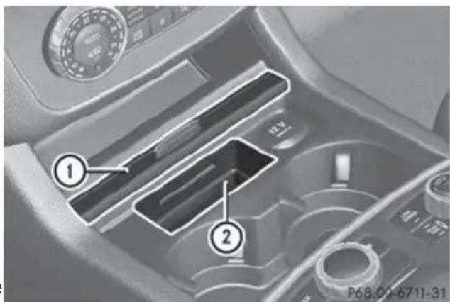 Mercedes-Benz GL (2014) - Stowage compartment in the front center console - 1