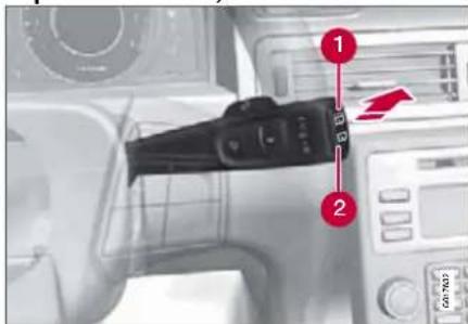Diagram showing a camera module with labeled parts and directional arrow, likely from an automotive or medical device interface.