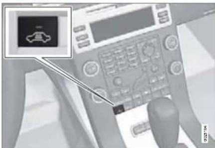 Close-up of a telephone handset with a small icon and label pointing to the right side of the device.