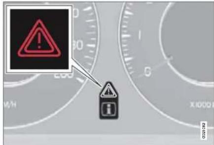 Warning sign with warning triangle and warning icon on a car dashboard, indicating vehicle safety or hazard detection.