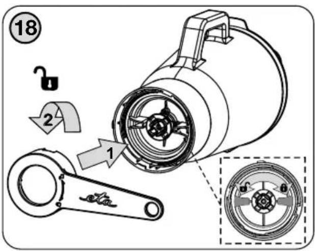 Technical diagram of a mechanical device with labeled parts and a close-up inset showing internal components.