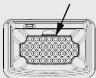Diagram of a device interior with a grid pattern and an arrow pointing to a component (no text or symbols)
