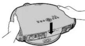 Diagram showing hands holding a device with Chinese text labels and an arrow pointing to a component