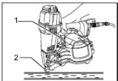 Technical diagram of a mechanical device with labeled parts 1 and 2, showing assembly or assembly steps.