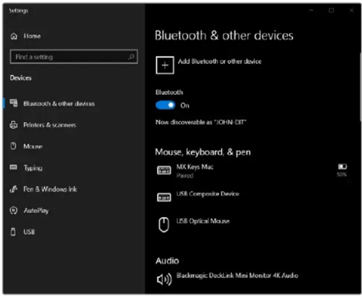 Settings Home Find a setting Devices Bluetooth & other devices Add Bluetooth or other device Bluetooth On Now discoverable as "JOHN-DIT" Mouse, keyboard, & pen MX Keys Mac Piarod 50% USB Composite Device USB Optical Mouse Audio Blackmagic DeckLink Mini Monitor 4K Audio