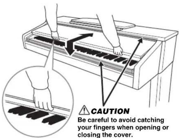 CAUTION Be careful to avoid catching your fingers when opening or closing the cover.