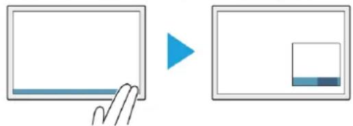 Diagram showing a hand pressing a slide with a blue arrow pointing to a small grid of colored squares inside a frame.