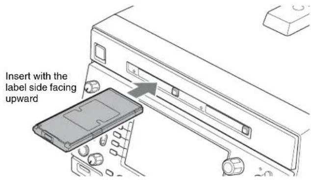 Insert with the label side facing upward