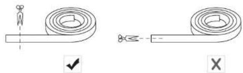 Diagram showing two types of coiled wires with symbols indicating correct and incorrect configurations, marked with check and cross symbols.