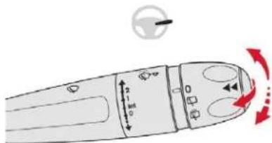 Diagram of a device with labeled ports and directional arrows indicating motion or flow, including a circular icon with a pointer.