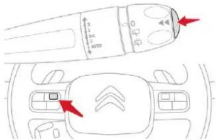 Diagram of a car interior with directional arrows and labeled components, including speedometer and vehicle layout.
