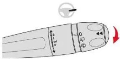 Diagram of a device's top-down view with labeled parts and directional arrows indicating movement or change.