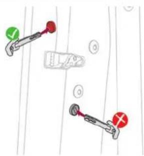 Diagram showing two car suspension systems with red and green labels indicating different positions or conditions