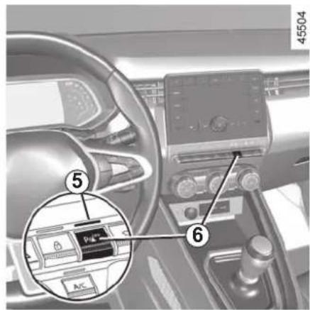 Interior view of a car dashboard with labeled parts including steering wheel, dashboard, and air conditioner unit