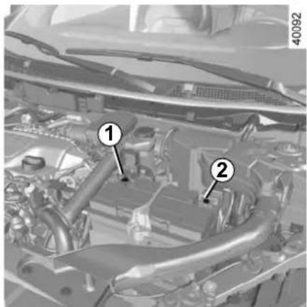 Technical diagram of an automotive engine bay with numbered components labeled 1 and 2