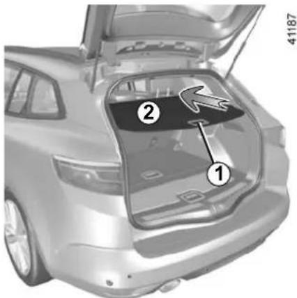 Diagram of a car trunk with labeled parts, showing internal components and directional arrow