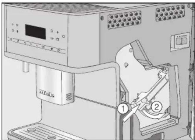MIELE MilkPerfection CM 6360 - Dropping a cleaning tablet into the brew unit - 2