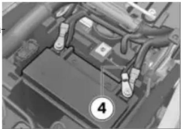 Close-up of an automotive battery pack with visible wiring and a numbered component (no text or symbols)