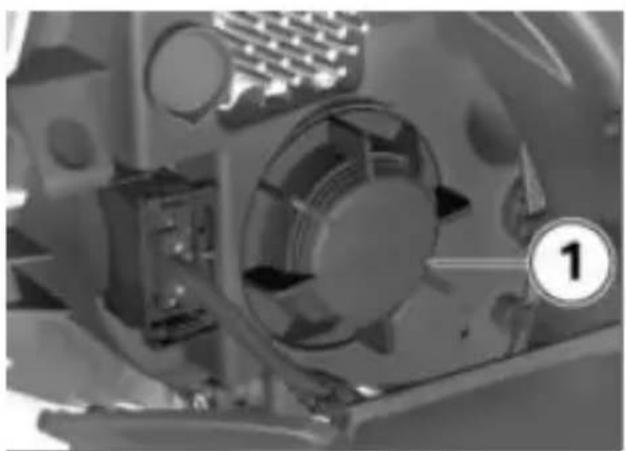 Close-up of a mechanical component with visible fan and housing (no text or symbols)