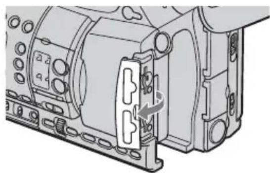 SONY HXR-NX5M - Open the cover in the direction of the arrow. - 1