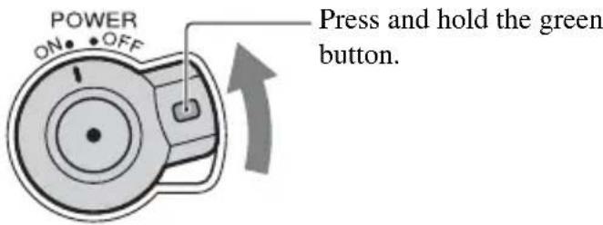 SONY HXR-NX5M - Slide the POWER switch to ON while pressing the green button. - 1
