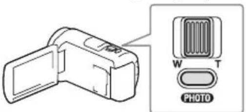 SONY HDR-PJ430VE - Podczas odtwarzania obrazów przesunąć widoczną na ekranie LCD ramkę wyboru, korzystając z dźwigni regulacji zbliżenia, po czym nacisnąć przycisk PHOTO. - 1