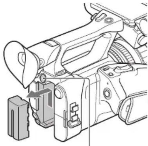 SONY HXR-NX200 - Vyjmutí baterie - 1