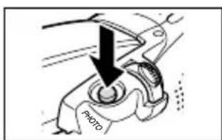 CANON MV630i - Press the PHOTO button fully. - 2