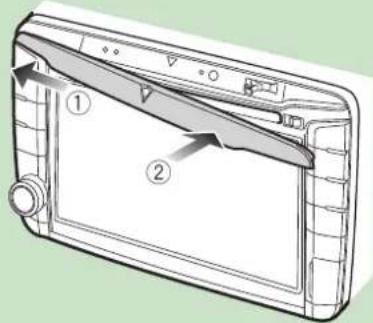 Diagram of a device with labeled parts, showing two numbered components and directional arrows indicating movement or flow.