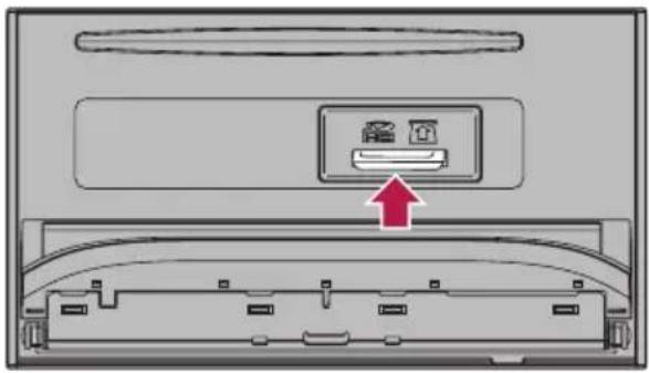 Diagram showing a device with a labeled component and an arrow pointing to it, indicating a process or operation.